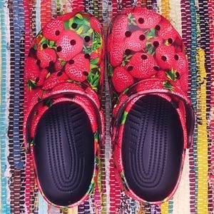 Used strawberry print crocs